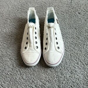 White slip on shoes